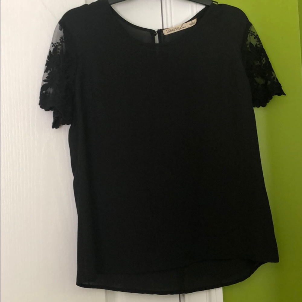 black shirt with floral sleeves